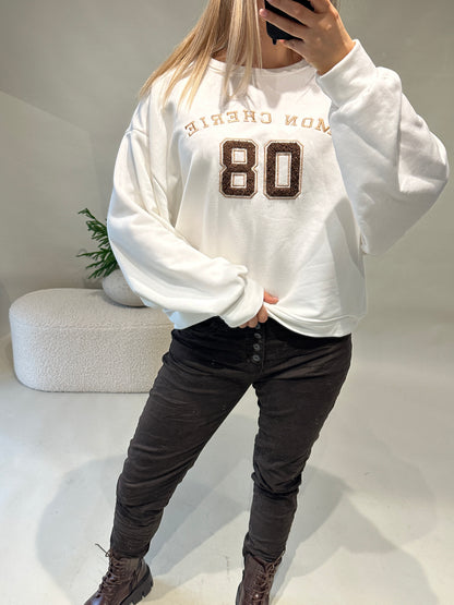 Pullover in Wollweiß mit Aufschrift in Schokobraun (MON CHERIE)