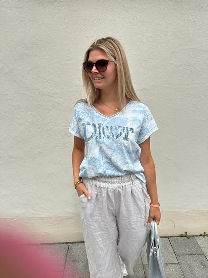 Shirt gemuster in Hellblau mit Aufschrift (Dior)