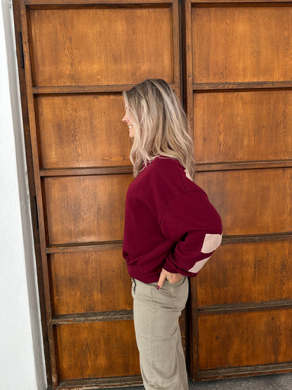 Pullover in Bordeaux mit Aufschrift am Rücken PARADISE