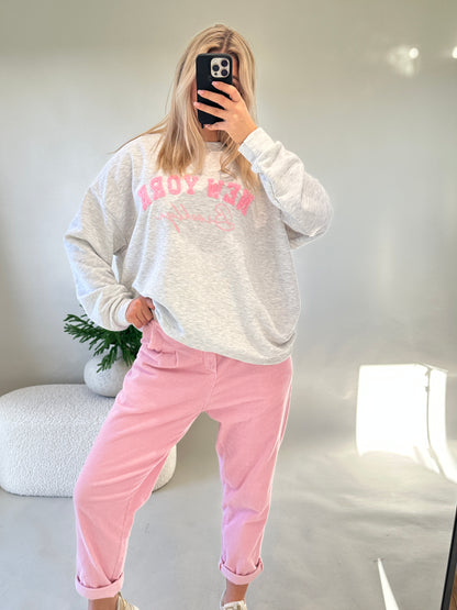 Pullover in Graumeliert mit Aufschrift in Rosa (NEW YORK)