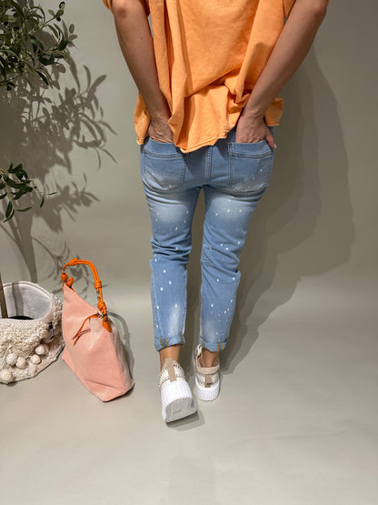 Jeans mit Orange/Weißen Aufdruck