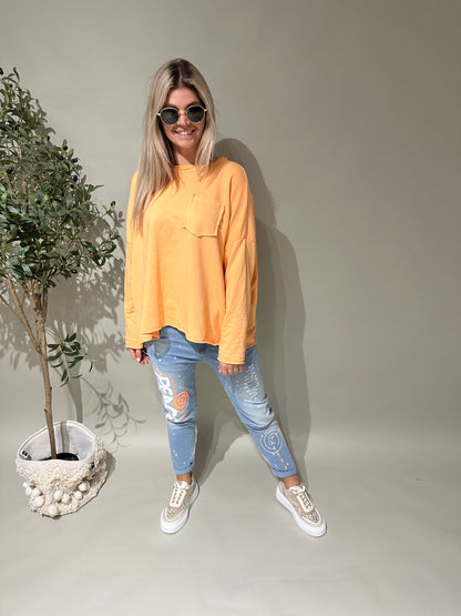 Shirt in Orange mit Brusttasche