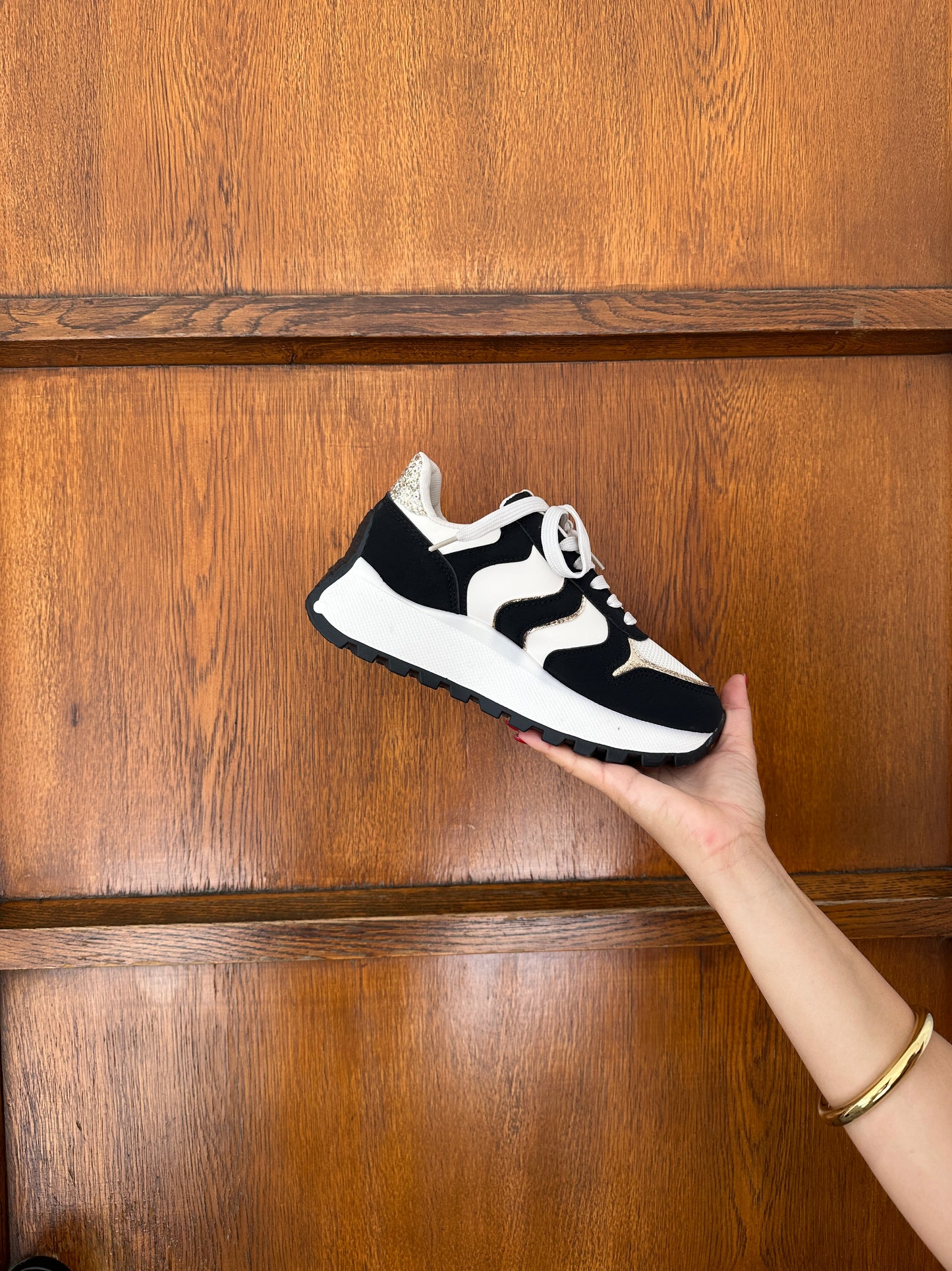 sneaker in schwarz/beige