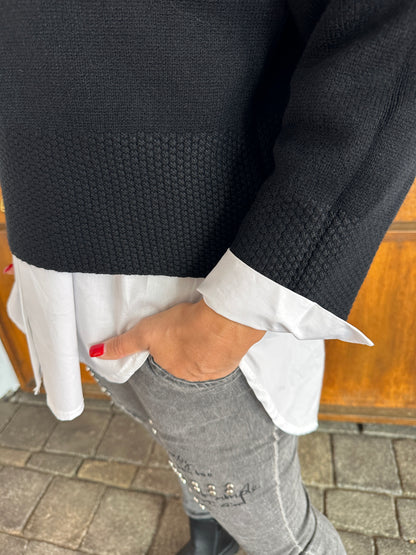 Pullover in Schwarz mit Waffelmuster am Bund und Ärmel