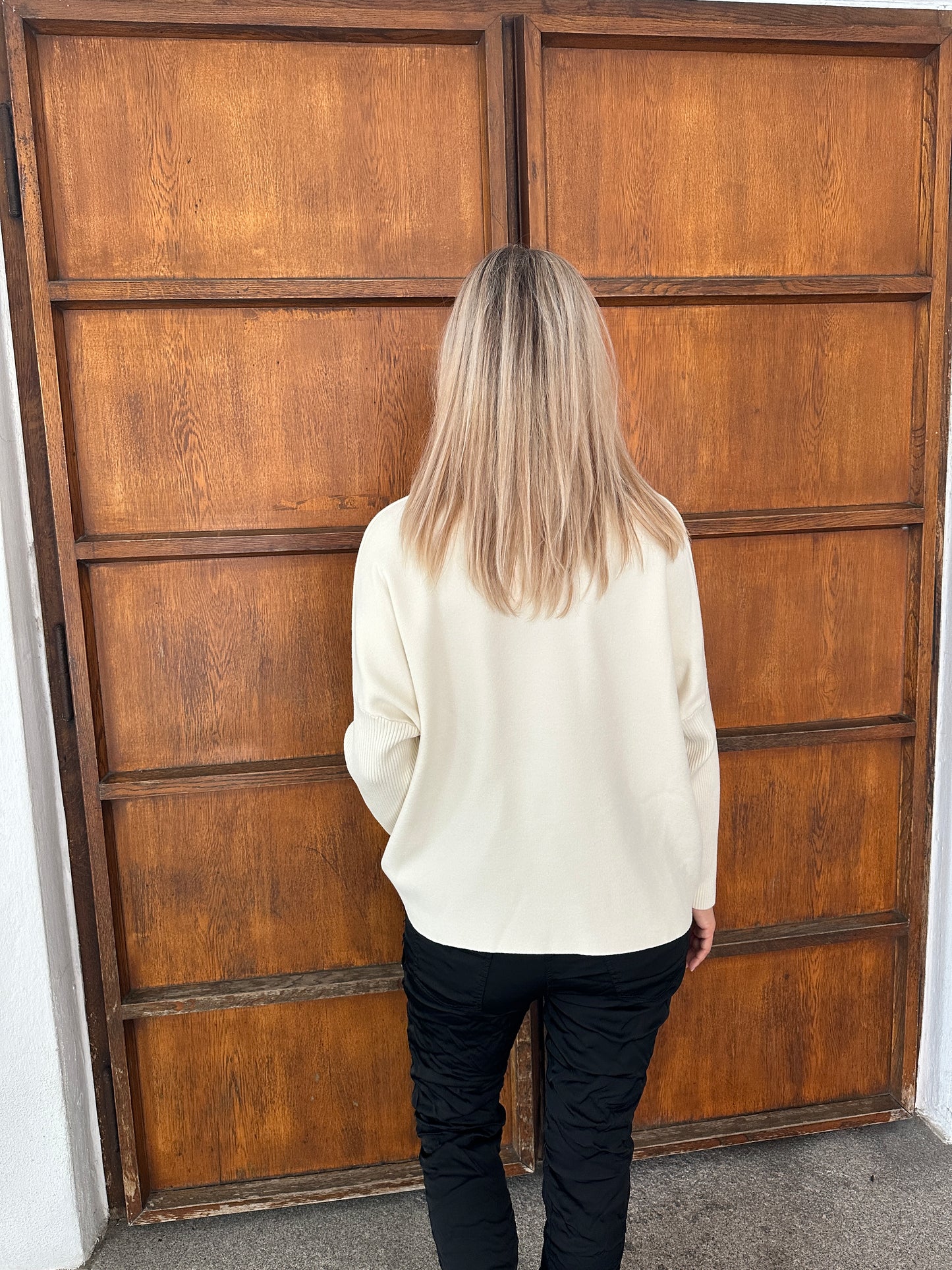 pullover in wollweiß