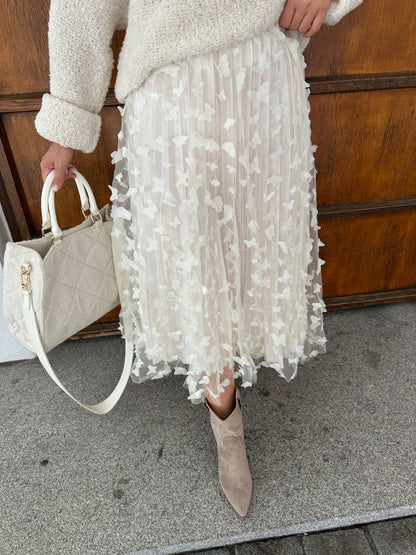 Rock mit Schmetterlinge in Wollweiß