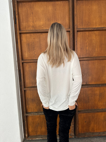 Shirt in Wollweiß mit Glitzeraufschrift in Silber Good Vibes